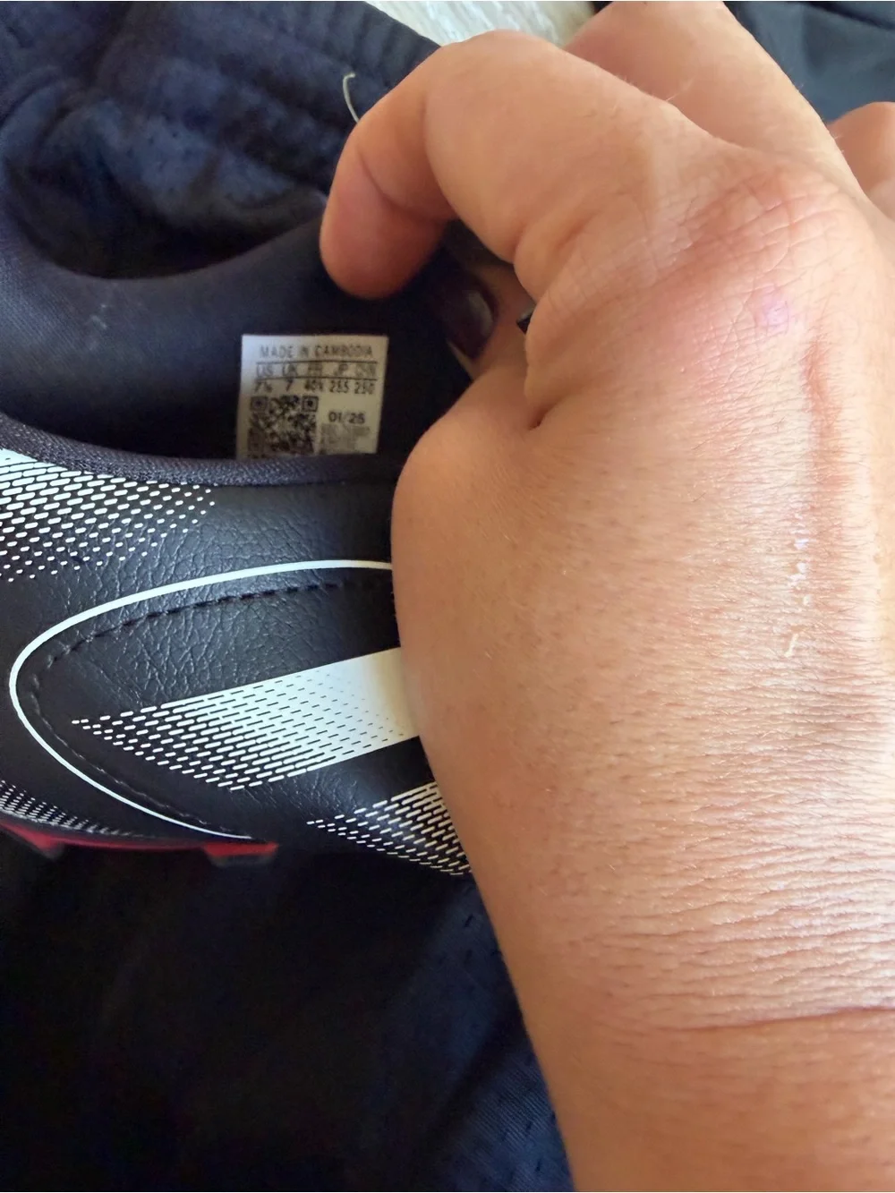 Black Men's Soccer Cleats with White Accents